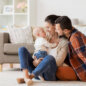 happy family with baby having fun at home